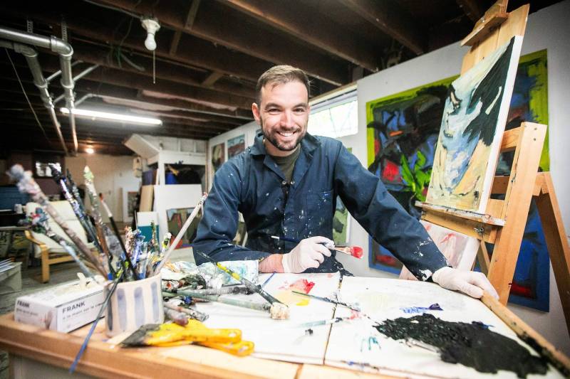 MIKAELA MACKENZIE / FREE PRESS
As a parent, painter and police officer — Brian Hunter juggles a demanding career and his passions.