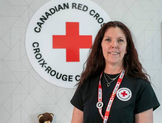 Debbie Blair volunteers with the Red Cross’s personal disaster assistance team at the organization’s Winnipeg office. (Brook Jones / Free Press)