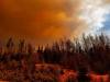 SUPPLIED PHOTO
                                Smoke from Manitoba wildfires along Hwy 10 between Flin Flon and Cranberry Portage in May. The federal government announced Tuesday that donations to the Red Cross wildfire relief efforts in Manitoba and Saskatchewan will be matched by both the federal and provincial governments.