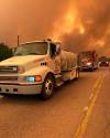 Buckland Fire and Rescue / The Canadian Press / HO-Facebook
                                A Buckland Fire and Rescue tanker truck is shown on a highway after being deployed to La Ronge, Sask., on June 2.