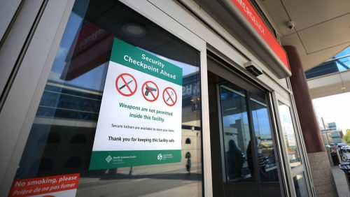 RUTH BONNEVILLE / FREE PRESS
                                A sign is posted outside the entrance to the Health Science Centre Emergency Entrance stating no weapons are allowed.