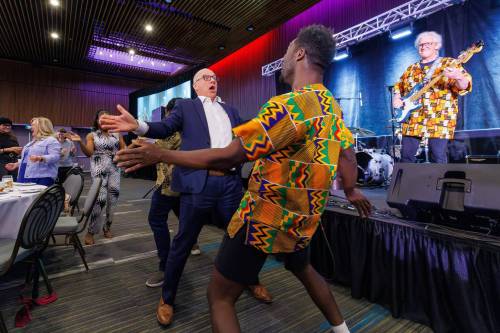 MIKE DEAL / FREE PRESS
                                Mayor Scott Gillingham dances to NAfro Dance at the Mayor&rsquo;s Luncheon for the Arts.