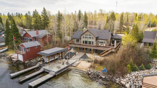 SUPPLIED
                                Essentially two cottages in one, this Maric-built masterpiece in Falcon Lake comes with six bedrooms, four-and-a-half baths, fabulous finishes and enchanting lake views.
