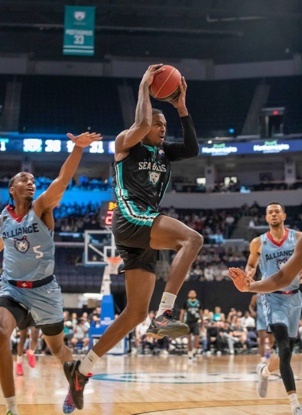 BROOK JONES/FREE PRESS
Sea Bears Alex Campbell (No. 5) leaps towards the hoop with the basketball during second quarter action.