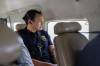MIKE DEAL / FREE PRESS
                                Premier Wab Kinew on a plane headed from Winnipeg to Flin Flon — which is threatened by a large wildfire — and Thompson, where some wildfire evacuees are staying, Thursday.