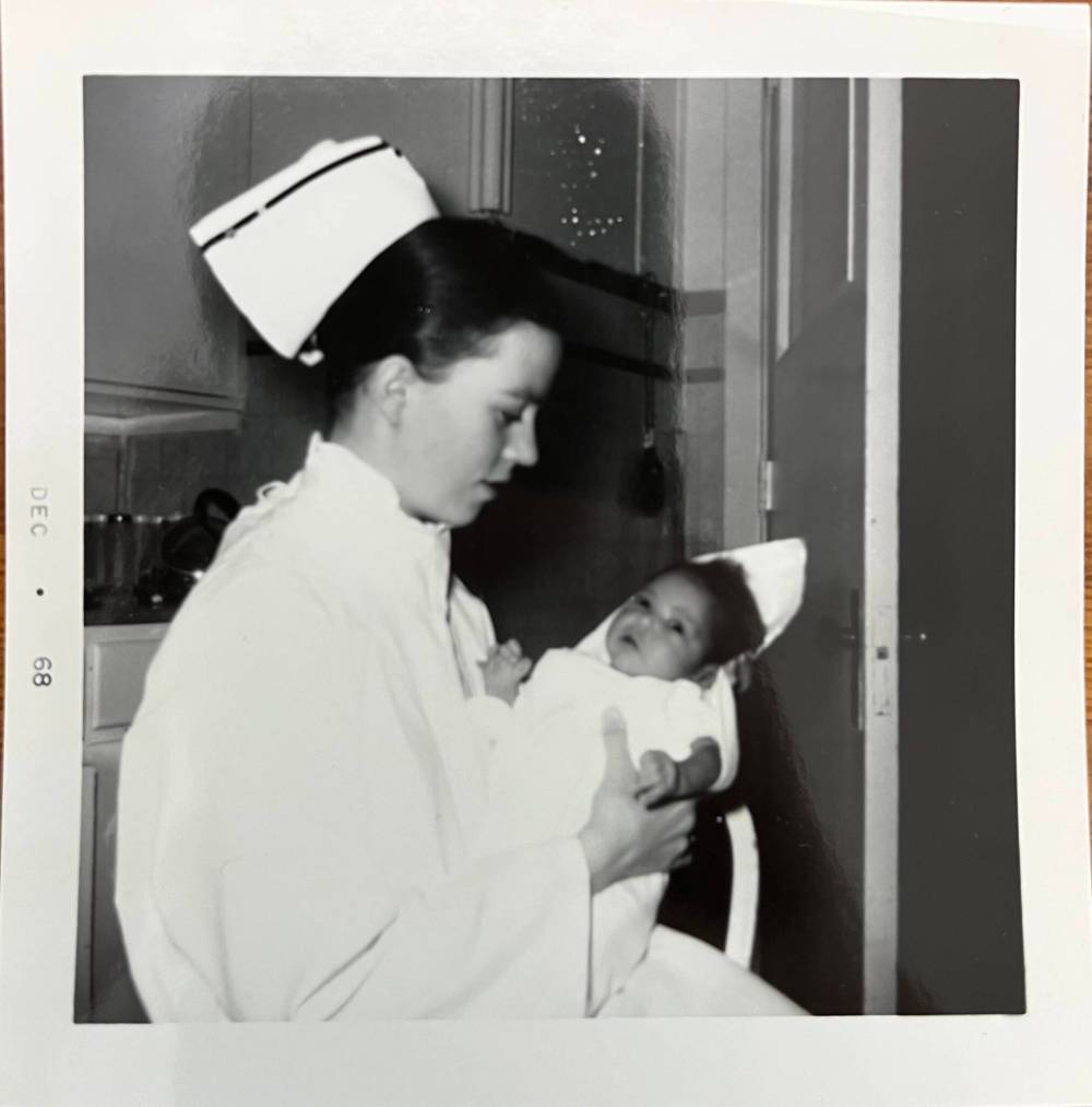 SUPPLIED
Janet MacKenzie with a baby she delivered while as a nurse in the Northwest Territories.