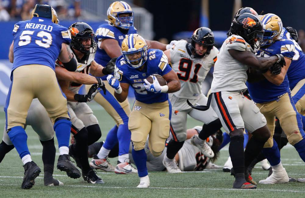 John Woods / THE CANADIAN PRESS
Bombers running back Matthew Peterson rumbled for a 38-yard touchdown in his CFL debutm finishing with 130 yards on 23 carries.