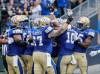 John Woods / THE CANADIAN PRESS
                                The Blue Bombers celebrate after Nic Demski (10) found the end zone Thursday against the Lions.