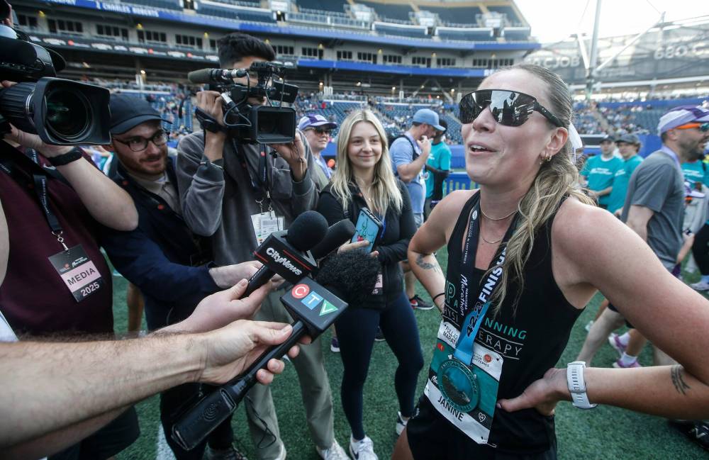 JOHN WOODS / FREE PRESS
Janine Zajac, 28, has been running since she was 7.