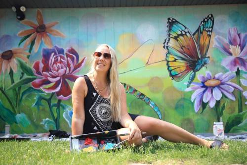 Photos by Ruth Bonneville / Free Press 
                                Mural artist Rachel Lancaster creates huge artworks to fill empty spaces and has painted walls, garage doors and the exteriors of sea containers.