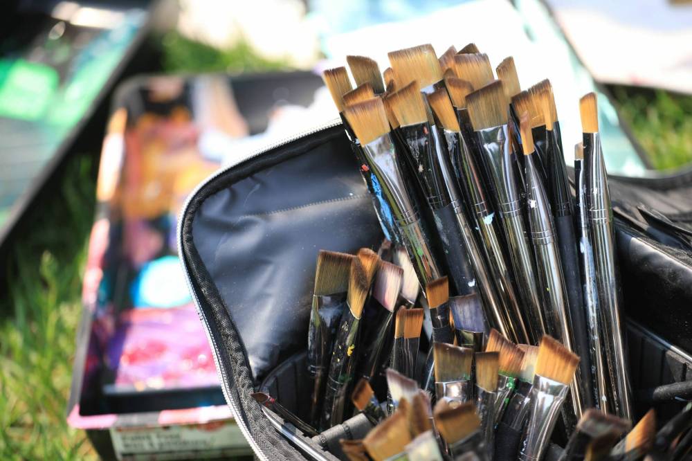 Ruth Bonneville / Free Press
Lancaster’s tools of her trade — painting brushes and palettes.