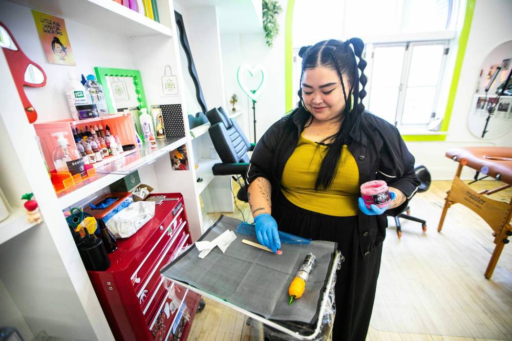 MIKAELA MACKENZIE / FREE PRESS
                                Tattoo artist Kiana Delos Santos says her work is about ‘becoming your true form.’