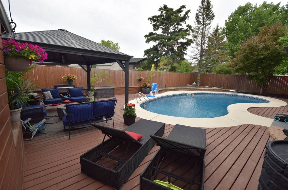 Photos by Todd Lewys / Free Press
A gorgeous in-ground pool is the centrepiece of the resort-like backyard at 214 Lynn Lake Dr., Lakeside Meadows in Transcona.