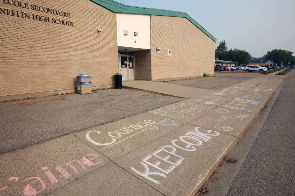(Tim Smith/The Brandon Sun)
Messages of affirmation and support written in chalk cover the sidewalks outside École Secondaire Neelin High School in Brandon after a fifteen-year-old student was attacked by a fellow student with a sword and seriously injured last week.
