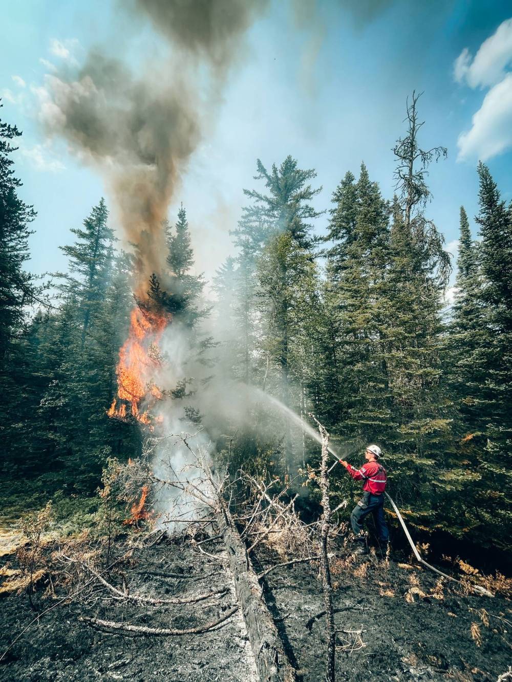 SOPFEU / FACEBOOK
Firefighters from the Quebec Forest Fire Protection Society help battle wildfires in Manitoba.