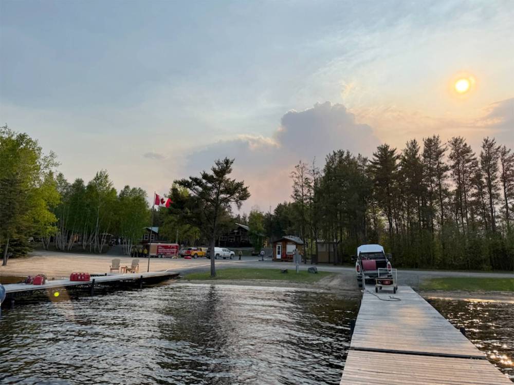 SUPPLIED
Wallace Lake Lodge on May 26 with wildfire smoke in background.
