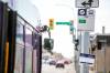 MIKAELA MACKENZIE / FREE PRESs fileS
                                A new bus stop sign on Notre Dame Avenue near Ellen Street. The overhaul of the Winnipeg Transit system focuses on frequency to make bus travel more attractive to riders.