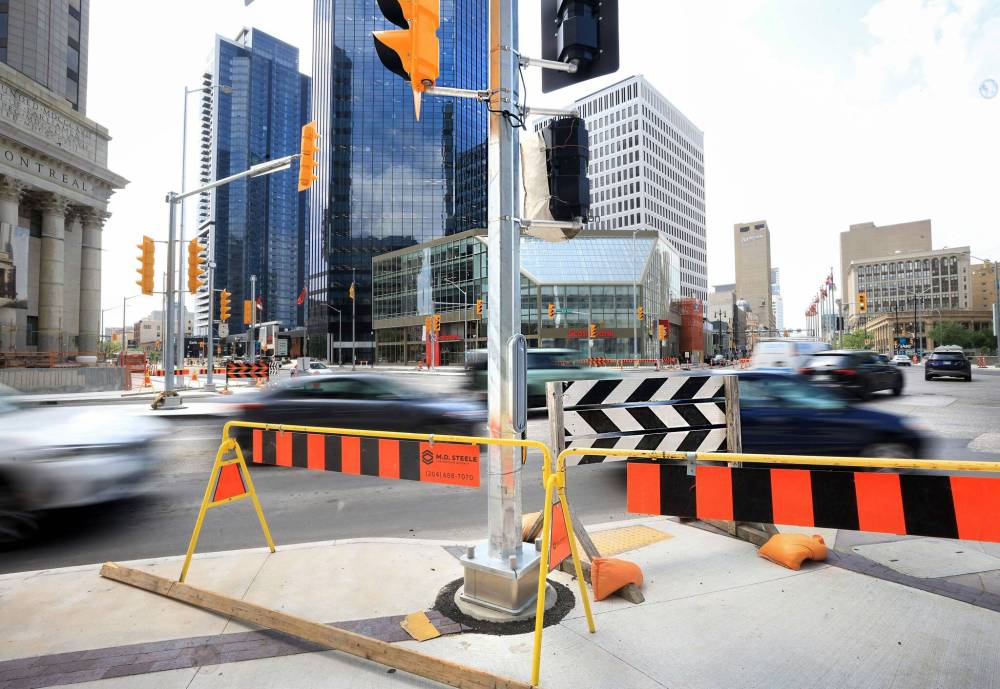 RUTH BONNEVILLE / FREE PRESS
                                The Portage and Main intersection is expected to re-open June 27.