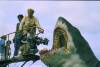 This image released by Peacock shows cinematographer Bill Butler, standing, and director Steven Spielberg during the filming of “Jaws.” (Peacock/Universal Pictures via AP)