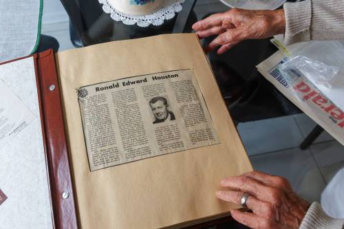 MIKE DEAL / FREE PRESS
                                Mary Houston has a scrapbook she made to collect all the newspaper and other information about her husband Ron&rsquo;s murder.