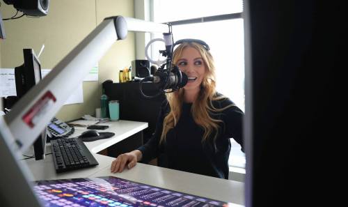 RUTH BONNEVILLE / FREE PRESS
                                best cdn music Photo of Vicki Shae, Country 99, in her studio on the 30th floor at 201 Portage. Story on local radio types sharing their favourite Canadian tracks, each of which, we should point out, is 100 per cent tariff-free.