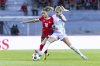 Switzerland's Viola Calligaris, left, and Norway's Ada Hegerberg, right, challenge for the ball during the Women's Nations League, group A2, soccer match between Switzerland and Norway in Sion, Switzerland, Tuesday, June 3, 2025. (Salvatore Di Nolfi/Keystone via AP)