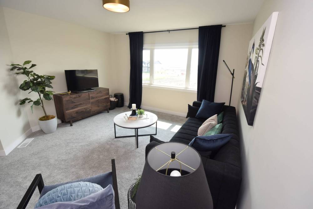TODD LEWYS / FREE PRESS
A versatile space, the naturally bright second-floor bonus room can be used for a variety of purposes.