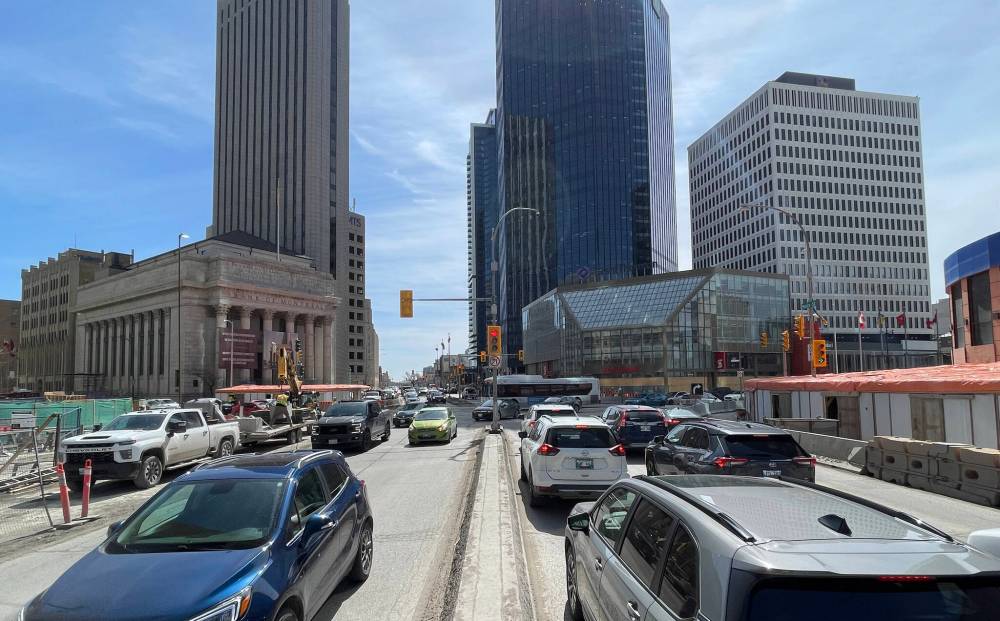 Motorists adjusted to the decrease in available road space during construction at Portage and Main. (Brent Bellamy photo)