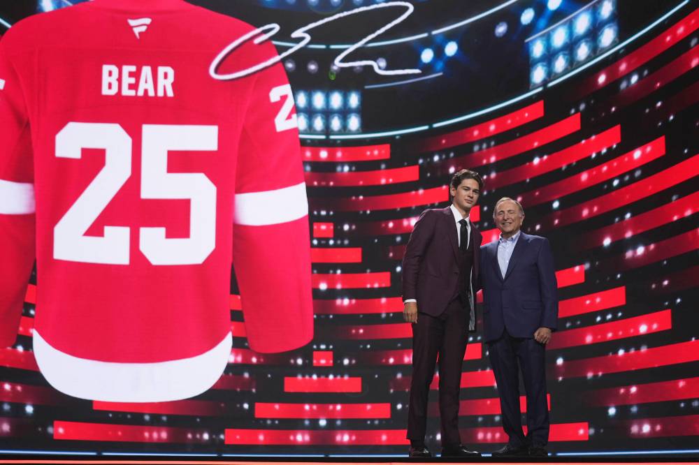 Damian Dovarganes / The Associated Press
Carter Bear (left) stands with NHL commissioner Gary Bettman Friday at the NHL Draft in Los Angeles. ‘I’m proud of where I’m from — my community and my Indigenous background,’ Bear said after being drafted.