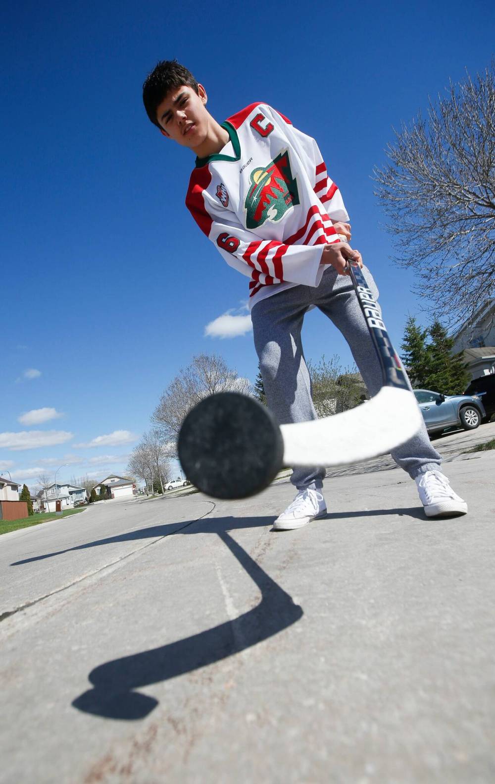JOHN WOODS / WINNIPEG FREE PRESS FILES
Hayden Paupanekis, then a Winnipeg Wild forward poses outside his home in 2022.