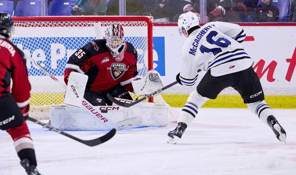 ROB WILTON/VANCOUVER GIANTS FILES
Vancouver Giants goalie Burke Hood, shown staring down Wenatchee Wild forward Maddix McCagherty.