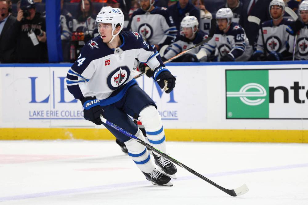 JEFFREY T. BARNES / THE ASSOCIATED PRESS FILES
Winnipeg Jets defenceman Haydn Fleury (24) skates during the first period of an NHL hockey game against the Buffalo Sabres in December 2024, in Buffalo, N.Y.