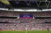 FILE - A video screen shows the attendance during the Women's Euro 2022 final soccer match between England and Germany at Wembley stadium in London, Sunday, July 31, 2022. (AP Photo/Alessandra Tarantino, FIle)