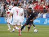 United States defender Alex Freeman (16) moves the ball past Turkey players including Kerem Aktürkoglu (7) during the first half of an international friendly soccer game, Saturday, June 7, 2025, in East Hartford, Conn. (AP Photo/Mary Schwalm)