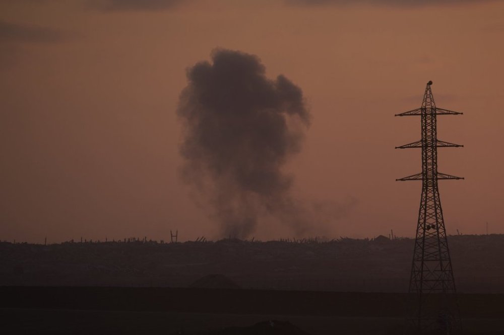 Smoke from an Israeli bombardment rises over the Gaza Strip, seen from southern Israel, Wednesday, July 2, 2025. (AP Photo/Ohad Zwigenberg)