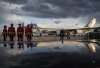 Mounties wait in front of Air Force 1 as U.S. President Donald Trump arrives in Calgary, Alta., on Sunday, June 15, 2025, to attend the G7 leaders meeting taking place in Kananaskis. THE CANADIAN PRESS/Jeff McIntosh