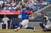 Toronto Blue Jays catcher Alejandro Kirk (30) hits a two RBI double against New York Yankees pitcher Will Warren (98) during first inning MLB baseball action in Toronto, on Wednesday, July 2, 2025. THE CANADIAN PRESS/Sammy Kogan