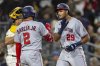 Washington Nationals' James Wood (29) celebrates his home run with Luis García Jr. (2) in the eighth inning of a baseball game against the San Diego Padres, Monday, June 23, 2025, in San Diego. (AP Photo/Tony Ding)
