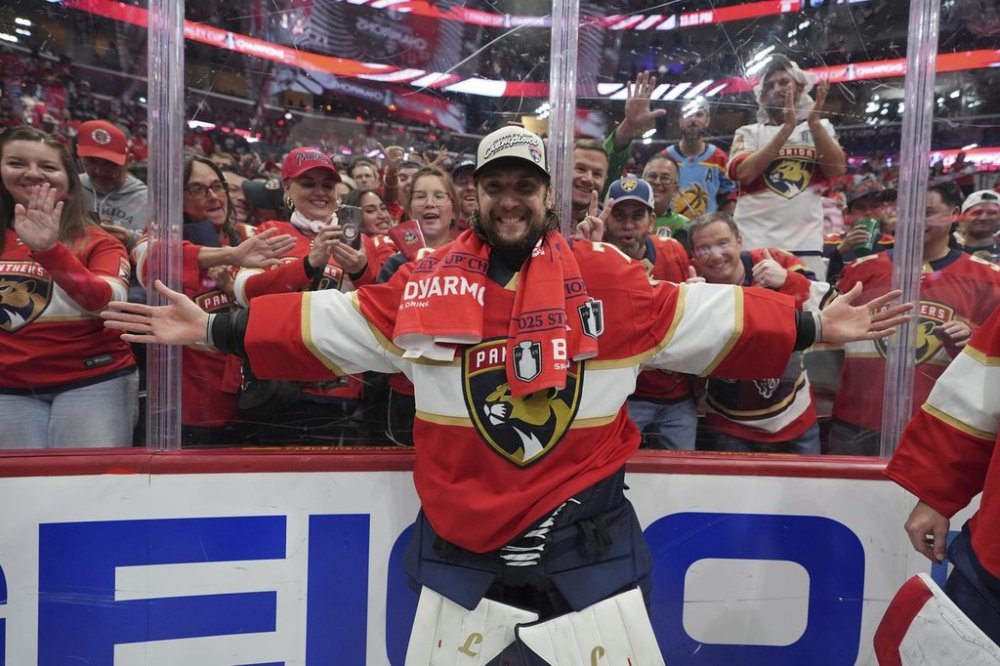 Florida Panthers goaltender Sergei Bobrovsky poses in front of fans after winning the Stanley Cup in Game 6 of the NHL hockey Stanley Cup Final against the Edmonton Oilers Tuesday, June 17, 2025, in Sunrise, Fla. (AP Photo/Lynne Sladky)
