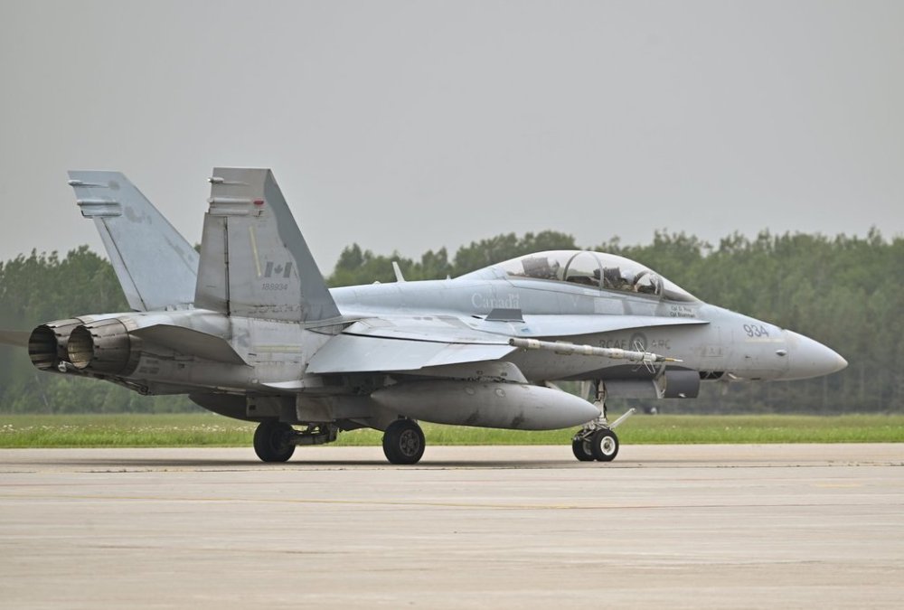 A CF-18 jet fighter is seen at CFB Bagotville, in Saguenay, Que., Wednesday, June 14, 2023. THE CANADIAN PRESS/Jacques Boissinot