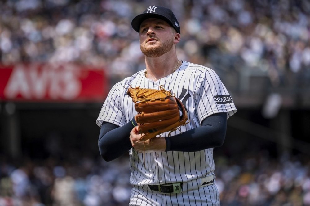 New York Yankees pitcher Clarke Schmidt (36) walks off the field during the fourth inning of a baseball game against the Athletics, Saturday, June 28, 2025, in New York. (AP Photo/Angelina Katsanis)
