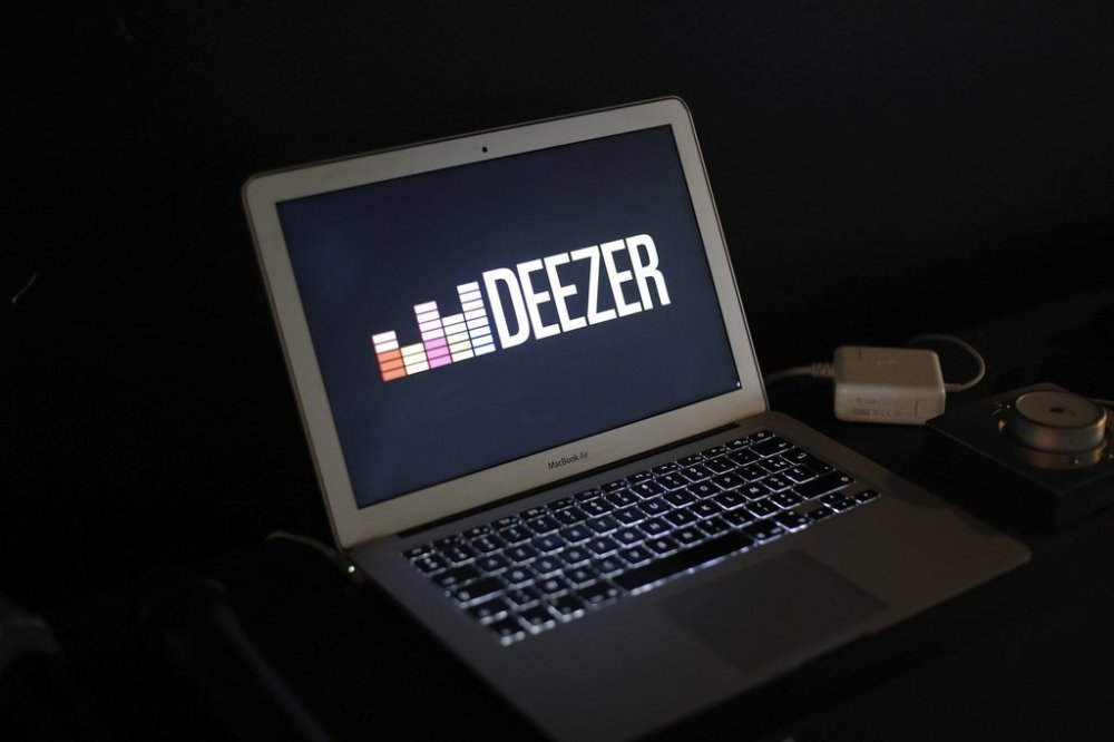 FILE - The music streaming services Deezer's logo is pictured at the company headquarters, in Paris, France, Monday, Nov. 9, 2015. (AP Photo/Thibault Camus, File)