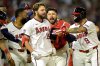 Los Angeles Angels' Nolan Schanuel, center, celebrates with teammates after a walk-off walk during the ninth inning of a baseball game against the Texas Rangers, Monday, July 7, 2025, in Anaheim, Calif. (AP Photo/Jayne Kamin-Oncea)