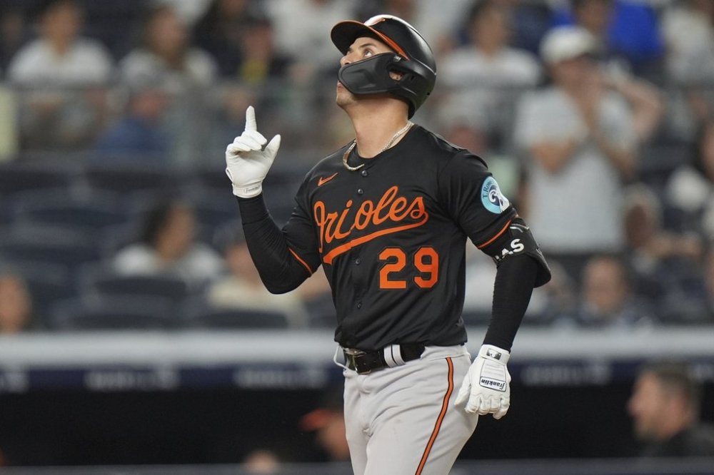 Baltimore Orioles' Ramón Urías gestures as he runs the bases after hitting a home run during the eighth inning of a baseball game against the New York Yankees Friday, June 20, 2025, in New York. (AP Photo/Frank Franklin II)