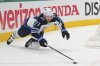 Winnipeg Jets' Nikolaj Ehlers dives to clear the puck in the second period of Game 3 of a second-round NHL hockey playoff series against the Dallas Stars in Dallas, Sunday, May 11, 2025. (AP Photo/Julio Cortez)