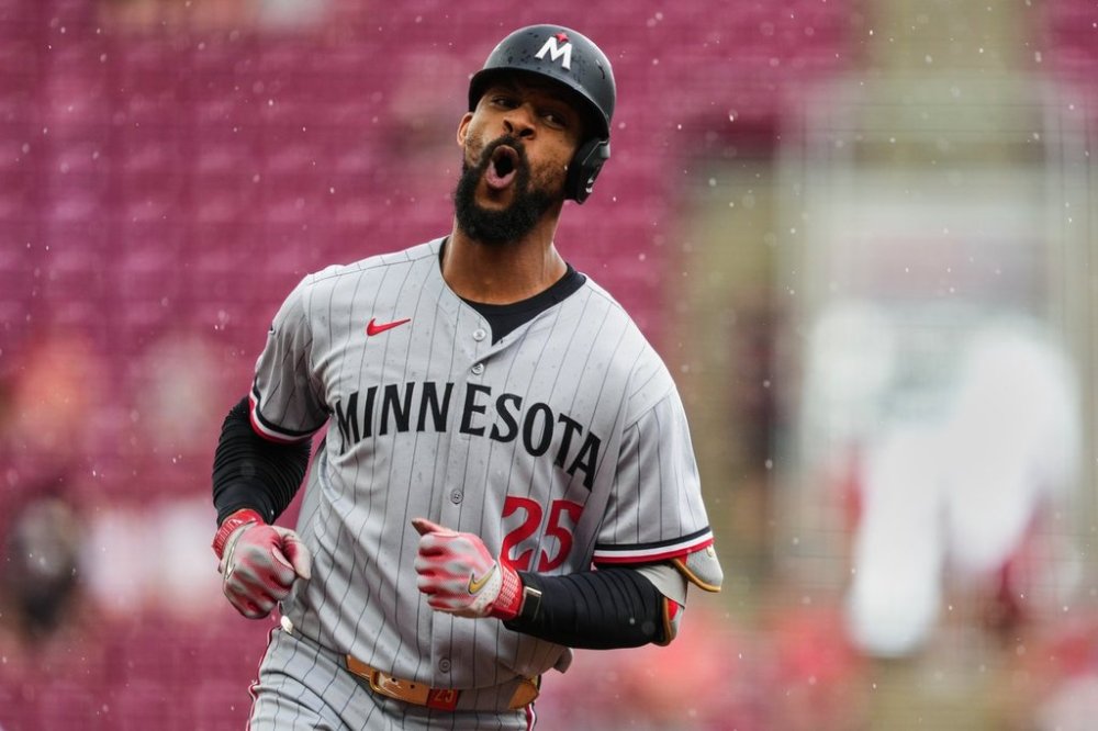 Minnesota Twins' Byron Buxton rounds the bases after hitting a solo home run during the first inning of a baseball game against the Cincinnati Reds, Thursday, June 19, 2025, in Cincinnati. (AP Photo/Grace Bradley)