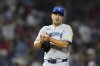Toronto Blue Jays pitcher Erik Swanson reacts after giving up a run to the Phillies in the eighth inning of a Major League Baseball game on Friday, June 13, 2025, in Philadelphia. (AP Photo/Derik Hamilton)