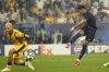 FILE - PSG's Desire Doue scores his side's second goal past Inter Milan's Federico Dimarco, left, during the Champions League final soccer match between Paris Saint-Germain and Inter Milan at the Allianz Arena in Munich, Germany, Saturday, May 31, 2025. (AP Photo/Luca Bruno, File)