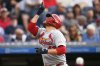 St. Louis Cardinals' Pedro Pagés gestures as he runs to home plate with a home run in the third inning of a baseball game against the Cleveland Guardians in Cleveland, Friday, June 27, 2025. (AP Photo/Sue Ogrocki)