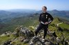 Wales head coach Rhian Wilkinson poses on the summit of Yr Wyddfa following a squad announcement press conference, in Snowdonia, Wales, Thursday June 19, 2025. (Nick Potts/PA via AP)